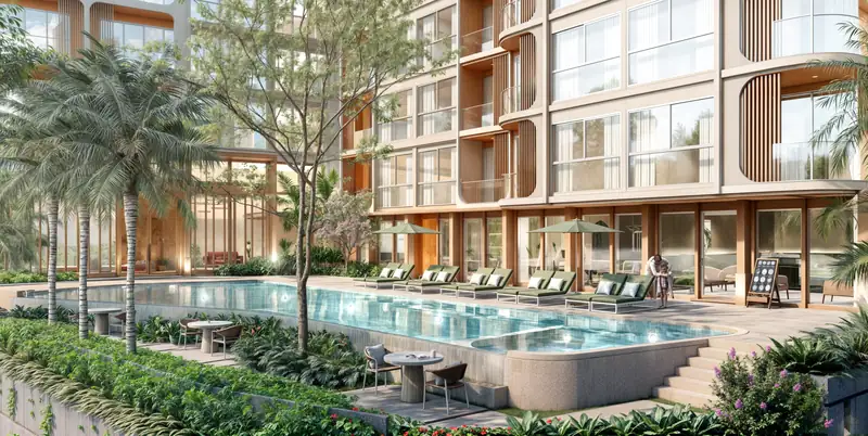 Saint Tropez Naithon — the pool running along the building with sun loungers