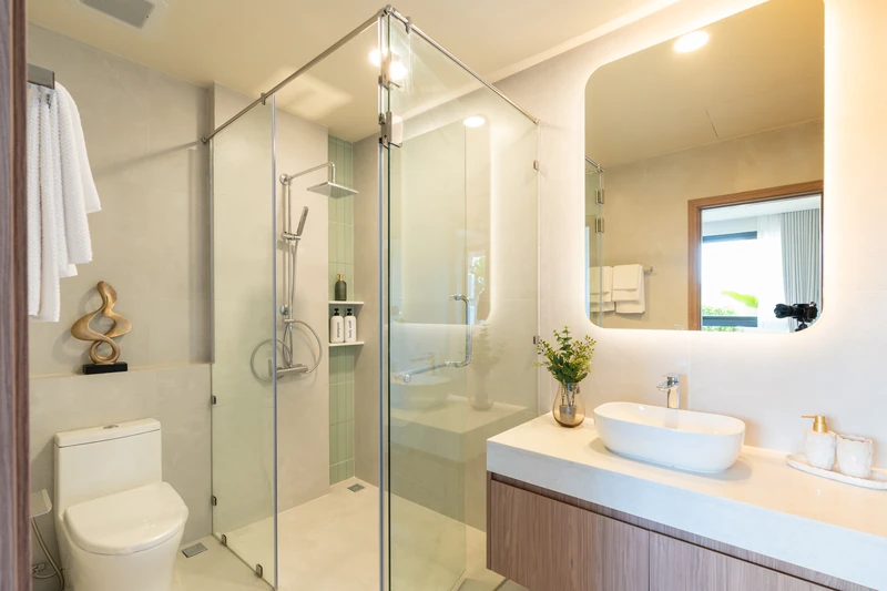 Saint Tropez Naithon — two-bedroom B1 show unit: bathroom with a glass shower